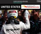 Lewis Hamilton celebrates his seventh victory of the season at the 2016 United States GP