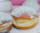 Delicious Donuts fillings and icing sugar on top