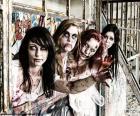 Four girls disguised as zombie to celebrate the feast of Halloween