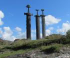 Sverd i fjell is a monument dedicated to the battle of Hafrsfjord the year 872, when the King Harald Fairhair gathered all Norway under his Crown. Three swords embedded in the rock. Of the sculptor Fritz Roed. Located in the fjord Hafrsfjord, Stavanger, Norway