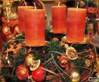 A nice advent wreath center for Christmas with four large candles red