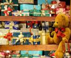 Shelves full of gifts for Christmas, even a teddy bear