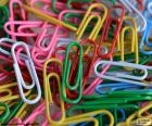 Paper clip with coating of plastic of colors. Used to hold sheets of paper together