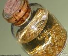 Gold (Au) ore/metal most coveted. It is a soft and yellow, precious metal