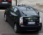 Paris taxi, they can be of any color. And its unique distinctive is a sign on the roof saying "TAXI PARISIEN"