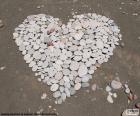 Large heart made with small stones, the symbol of the love