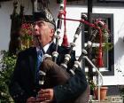 Bagpipe Player, an instrument of wind