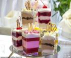 Desserts served in individual cups of cheese mascarpone cheese with fruit, or many other ingredients