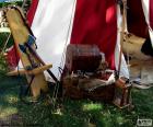 Multiple objects of a medieval knight in a camp