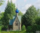 Small chapel located in a wooded area of Russia