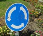 Vertical signal of roundabout where designates the mandatory rotating sense