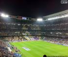 The Santiago Bernabeu Stadium is the stadium of the Real Madrid Football Club, located in the Paseo de la Castellana, in the District of Chamartín in Madrid, Spain