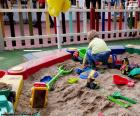 Child in sandbox