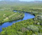 The Ebro river as it passes through Miravet, Tarragona, Catalonia, Spain