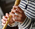 Learning to play the flute, one of the instruments most used by teachers for the initiation of students in music