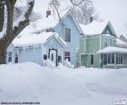 Two snow-covered houses