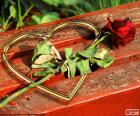 A heart and a red rose, symbols of love for Valentine's day