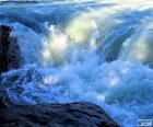 Image of a Rapids, caused by an increase in the speed and the water turbulence