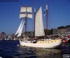 A large sailboat arriving in the city of Hamburg, Germany