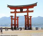 The large Torii of Itsukushima Shrine during low tide, Japan