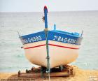 Boat grounding on the beach