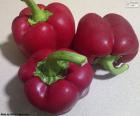 Three red peppers