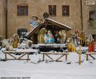 The representation of the birth of Jesus, the Nativity scene on a snowy day