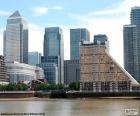 Canary Wharf a major business district in east London, located in the Isle of Dogs in the area of Tower Hamlets