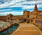 The Plaza of Spain is an architectural complex located in the Parque de Maria Luisa of Seville city, Spain