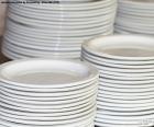 Pile of white porcelain plates