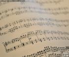 Sheet music is a handwritten or printed document that indicates how a musical composition must be interpreted