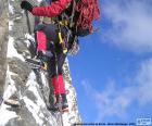 Equipped climber to climb in winter