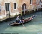 The gondolier is the person who manages or governs a gondola, a traditional rowing boat from Venice