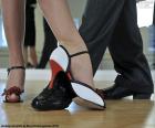 Couple dancing tango. The tango is a musical genre and dance, from the region of the Río de la Plata and its area of influence, mainly in the cities of Buenos Aires (Argentina) and Montevideo (Uruguay)