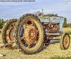 An old tractor possibly the most used agricultural vehicle for work in the field