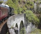 Train passing through a viaduct