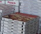 Several boxes of pizza delivery cardboard