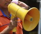 A megaphone is a portable or cone-shaped handheld acoustic speaker used to amplify the voice
