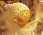 Cute figure of a smiling Christmas angel