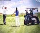 Couple playing golf