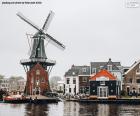 The De Adriaan mill is an apron windmill on the banks of the scenic Spaarne River. Originally built in 1778, it was rebuilt shortly after suffering a fire in 1932. Haarlem, Netherlands