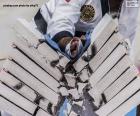 Martial arts athlete breaking several pieces of concrete