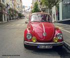 A nice red Volkswagen Beetle