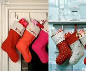 Several hanging Christmas stockings full of gifts puzzle