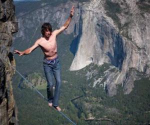 Slacklining is a practice in balance that uses 1 inch nylon webbing tensioned between two anchor points puzzle