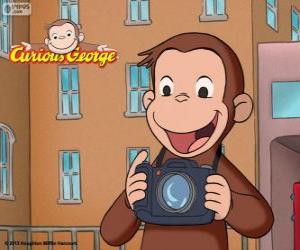 The curious monkey George with a camera puzzle
