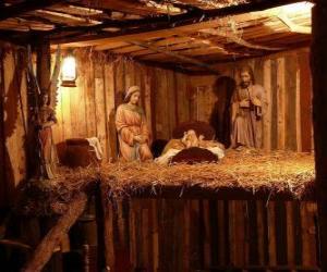 The Nativity scene figurines in a small wooden building puzzle