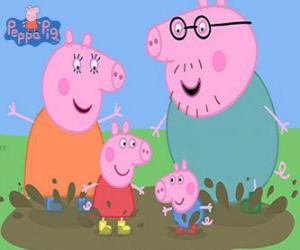 The Pig family playing with the puddles puzzle