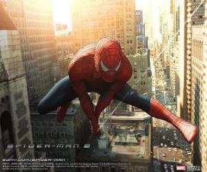 The superhero Spiderman leaping between the buildings in the city swinging with his spider web puzzle