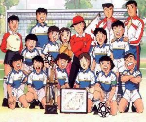 The team of Captain Tsubasa with a trophy puzzle